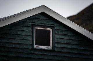 Maison à ossature bois avec bardage vertical en bois